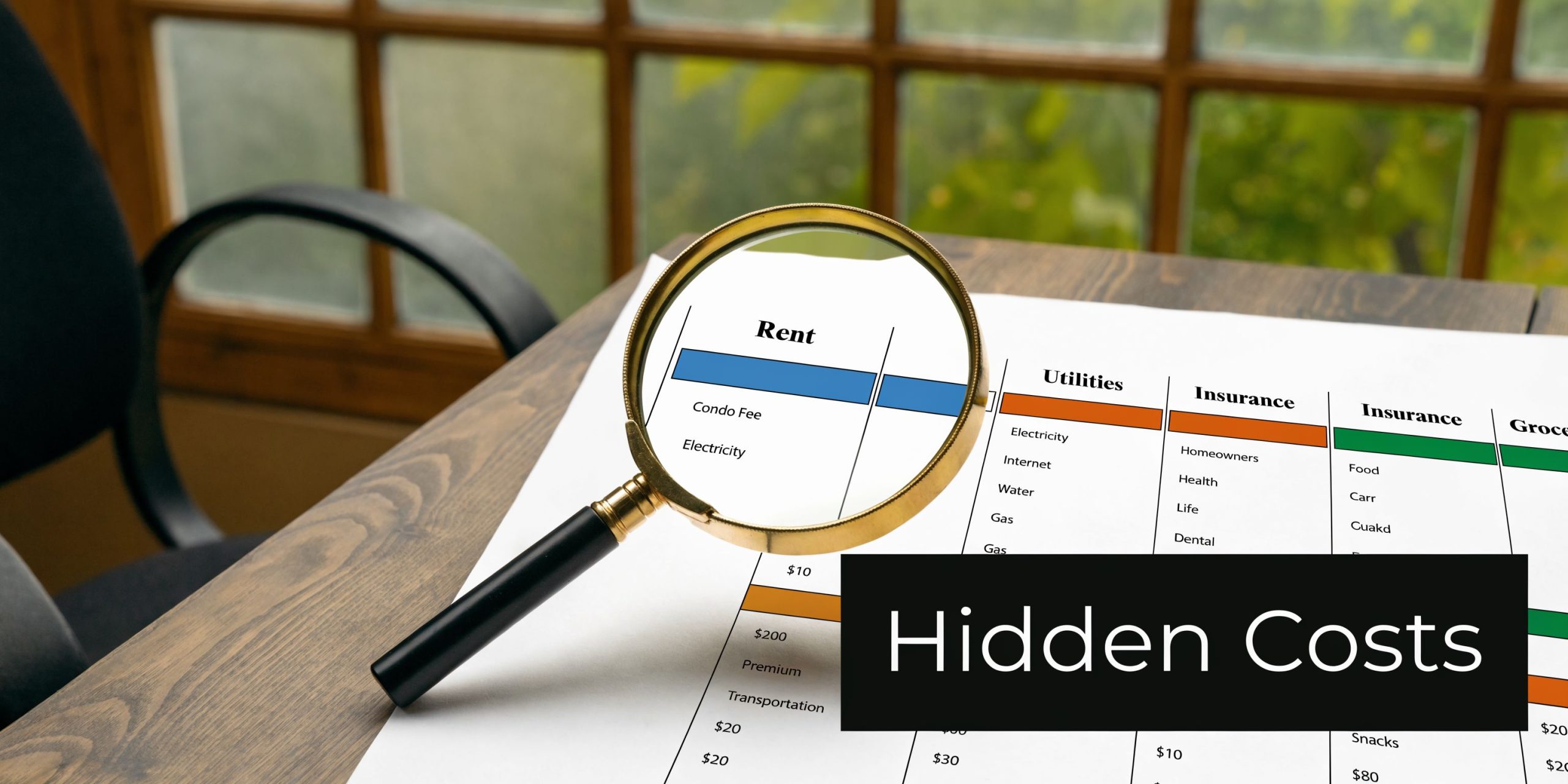 A magnifying glass inspecting a list of various monthly living expenses labeled as hidden costs on paper.